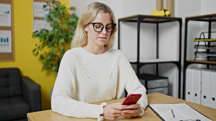 Sticker - Young blonde woman business worker using smartphone working at office