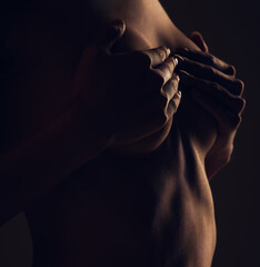 breast, hands and woman silhouette dark background of skin, body and model with glow, light and art 