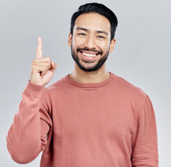 Aufkleber - Smile, space and portrait of Indian man pointing up, mockup and product placement isolated on white background. Promotion, information and person showing deal announcement in studio with launch idea.