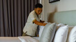 © Didik - House keeper activity to make up villas