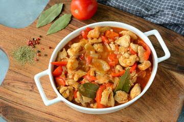 Wall Mural - Hungarian turkey stew in tomato sauce and red pepper