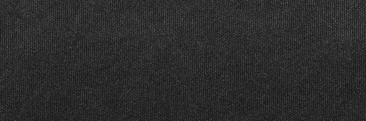 Black color sports clothing fabric football shirt jersey texture and textile background, wide banner.