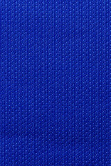 Canvas Print - Dark blue color sports clothing fabric football shirt jersey texture and textile background.