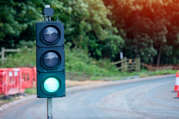 Close-up of temporary portable traffic signal  installed for road works