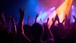 © YuDwi Studio - Rear view of crowd with arms outstretched at night club concert, blue purple light background by ai generative