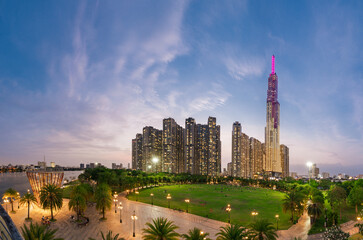 Wall Mural - Beautiful night at landmark 81, the tallest building in Vietnam. The building lights up with colorful lights in the evening