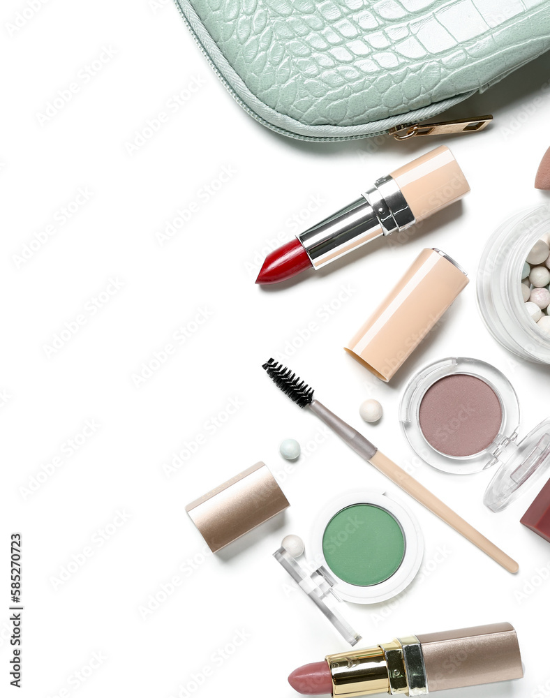 Set of decorative cosmetics with bag isolated on white background