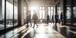 © bahadirbermekphoto - Group of office employees at coworking center. Business people walking at modern open space. Motion blur. Generative AI