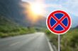 © New Africa - No Stopping road sign on highway, space for text