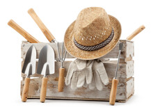 Gardening Tools Set, Wooden Crate With Aluminum Garden Kit Tools, Trowel With Wooden Handle, Straw Hat And Protective Gloves, Isolated On White Background. Concept Of Work Or Sale Garden Products