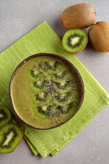 Wall Mural - Green smoothie bowl of kiwi fruit