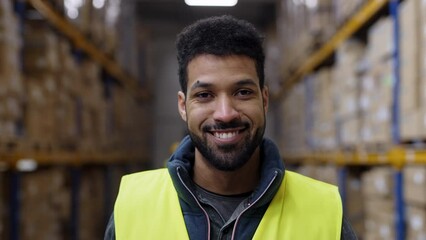 Poster - Video of a warehouse worker or supervisor walking towards the camera.