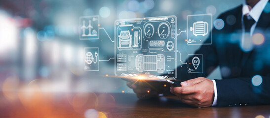 Man engineer used digital tablet for car design analysis and improvement. Energy EV car concept. Futuristic hybrid vehicle charge battery electric and environment friendly. green eco technology