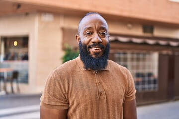 Poster - Young african american man smiling confident standing at street