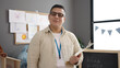 © Krakenimages.com - Young hispanic man preschool teacher holding clipboard at kindergarten