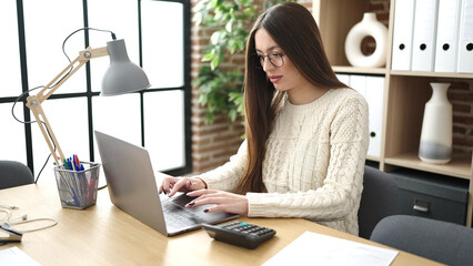 Sticker - Young beautiful hispanic woman business worker using laptop working at office