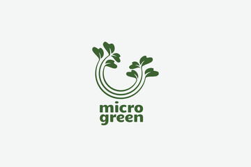 dynamic microgreen logo with vegetable sprouts as the icon.