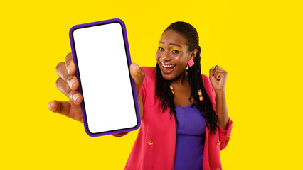 Excited Black Lady Showing Big Phone Gesturing Yes, Studio Shot