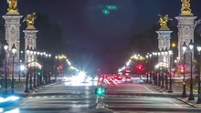 Avenue Du Marechal Gallieni With Traffic And Night Illumination Timelapse. Avenue Connects Les Invalides (National Residence Of Invalids) Complex And Alexandre III Bridge. Paris, France