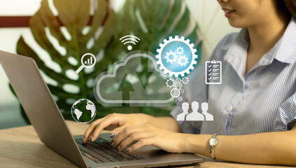 Fototapete - Cloud computing technology and online data storage for business network concept. Businesswoman using laptop computer connects to internet server service for cloud data.