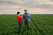 © Vesna - A woman agronomist and a young farmer