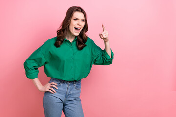 Sticker - Photo of unhappy irritated lady dressed green blouse pointing finger empty space isolated pink color background