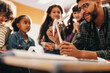 © Jacob Lund - Diverse young students learn about wind power during a science lesson in elementary school