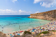Isola dei Conigli (Rabbit Island) and its beautiful beach with turquoise sea water. Lampedusa, Sicily, Italy.