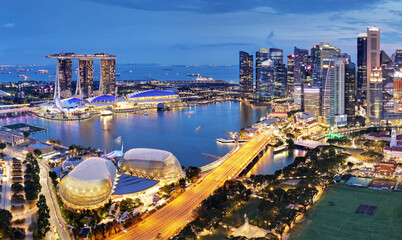 Wall Mural - Aerial view of Singapore business district and city at twilight in Singapore, Asia