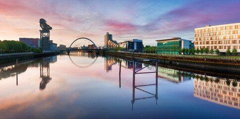 Wall Mural - Glasgow panorama at dramatic sunrise with Clyde river, Scotland