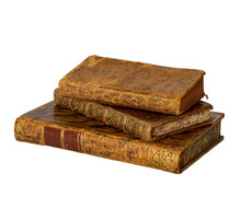 Pile Of Antique Books With A Leather Cover And Golden Ornaments On Isolated On White Background