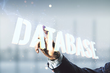 Poster - Double exposure of male hand clicks on Database word sign on blurred office background, global research and analytics concept