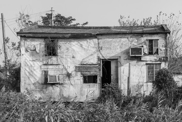 Wall Mural - Abandoned residential house in rural area of Hong Kong city