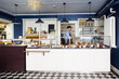 © Astrakan Images - Young owner working in bakery
