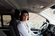 © 23_stockphotography - Woman waiting inside her car