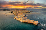 Fototapeta  - Landscape with Syracuse at sunset, Sicily islands, Italy