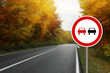 © New Africa - No Overtaking road sign on highway, space for text