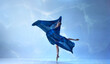 One emotional ballerina wearing bodysuit dancing with silk on fingertips with hands over blue background
