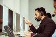© chokniti - Group of call center business operator customer support team phone services working and talking with headset on desktop computer, Reception secretary answering client phone call at customer service
