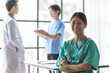 © Wasan - Portrait of a female doctor in the examination room at the hospital.