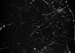 A badly broken glass on a dark surface, many sharp irregular shards. Useful texture overlay. Generative AI.
