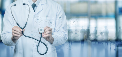 Doctor shows a stethoscope on the background of a virtual screen.