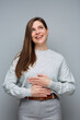 © Yuriy Shevtsov - Happy cheerful woman looking up holding hands on stomach. isolated portrait.