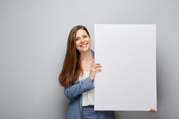 smiling business woman holding white sign board.
