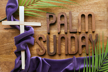 Wall Mural - Palm sunday background. Cross and palm on vintage background.