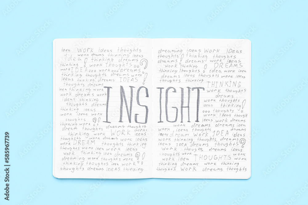 Notebook with word INSIGHT on blue background