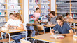 © JackF - Portrait of a schoolboy preparing for an exam in the school library