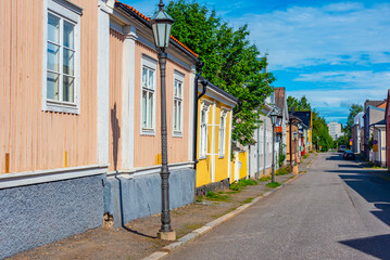 Wall Mural - Colorful timber houses in Neristan district of Finnish town Kokkola