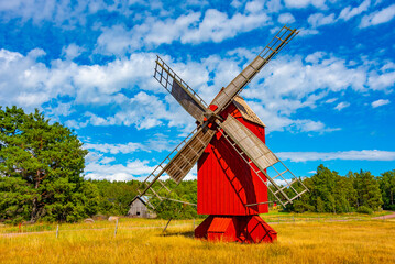 Wall Mural - Red windmill at Aland islands