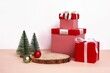 Closeup shot of a Christmas decorative composition with gift boxes and Christmas trees